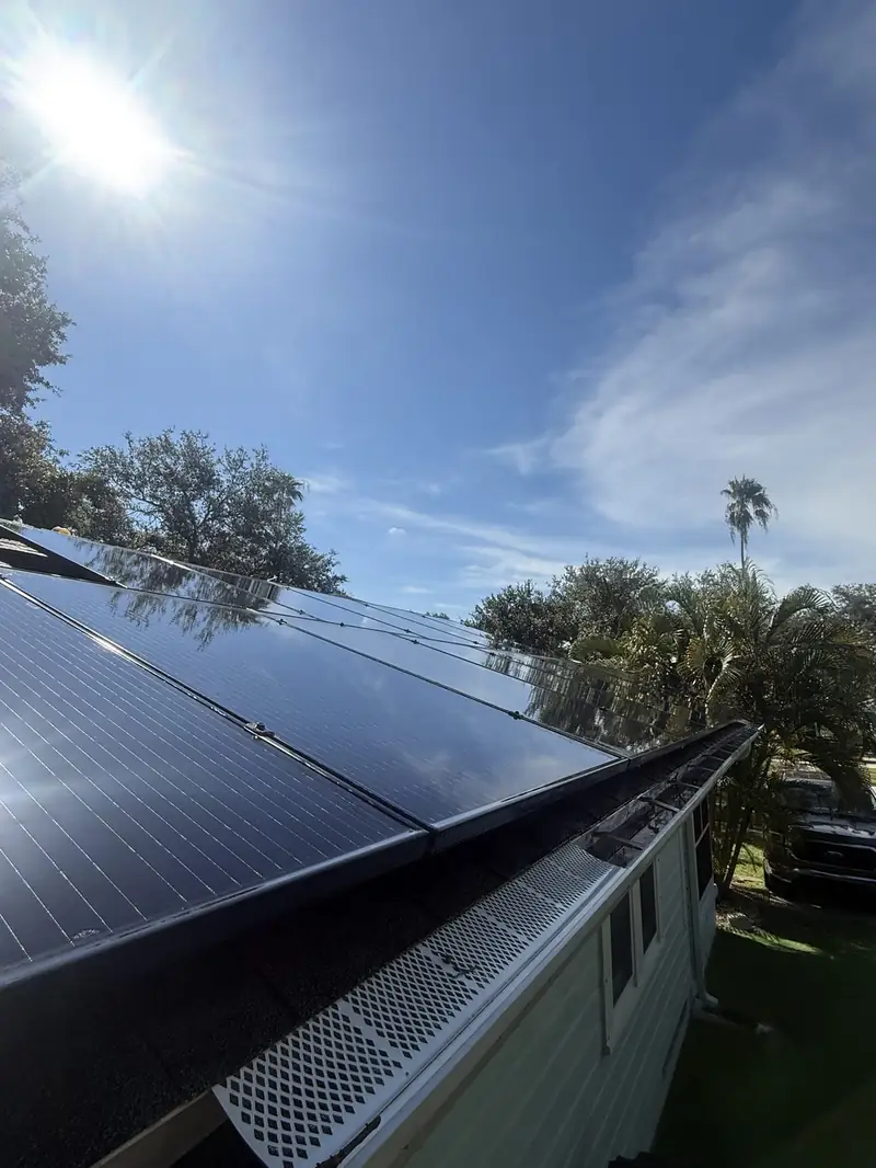 Clean solar panels with the sun above